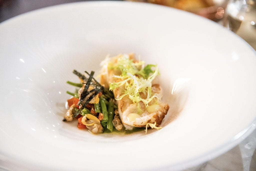 Tables are shared, kitchens become a stage for performing chefs, and especially after lockdown, spaces are opening up, inviting customers into the mix, so they don't feel alone anymore.
