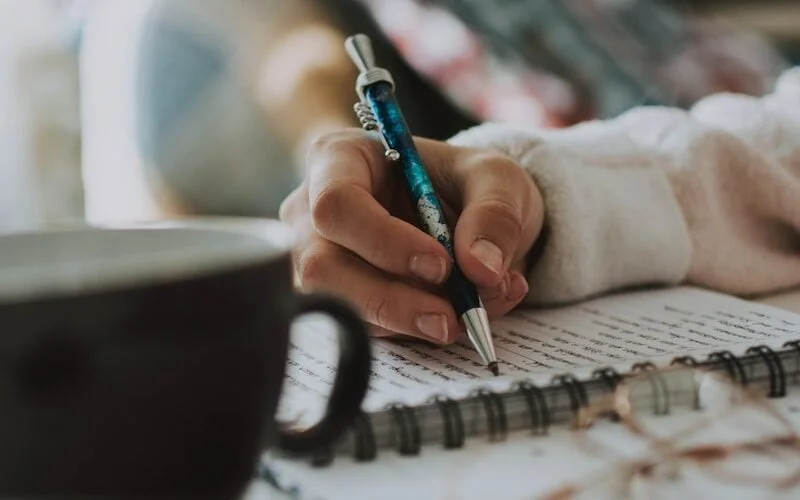 selective focus photography of pen