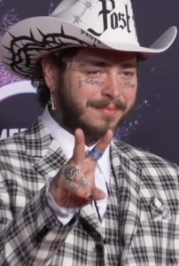 Austin Post Malone, born on Independence Day , at the 2019 American Music Awards