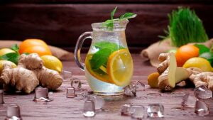 clear glass pitcher with lemon juice