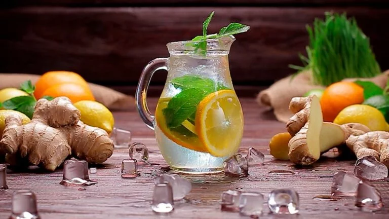 clear glass pitcher with lemon juice