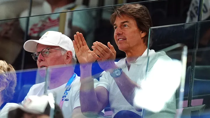 Tom Cruise and Snoop Dogg were spotted cheering at the Women's Gymnastics event at the Olympics, showcasing celebrity support for the athletic excellence.