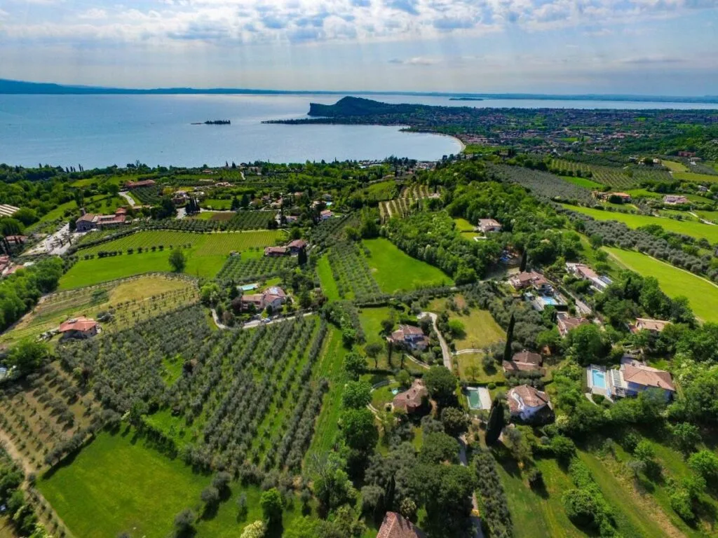 Tucked between olive trees and cypress-lined paths on the western shores of Lake Garda, Campeggio Europa Silvella is the perfect glamping spot in Italy, a tranquil escape designed for those who crave a touch of elegance with their nature.