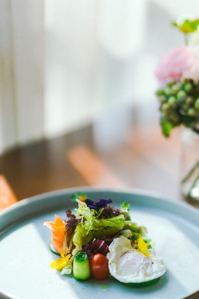 green and yellow vegetable salad on white ceramic plate
