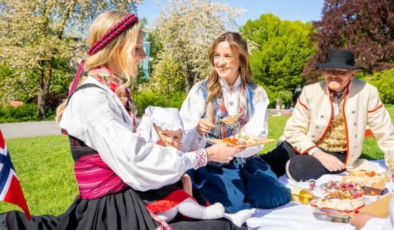 Norway's Constitution Day celebrates freedom & resilience through traditional parades, iconic attire & community values, blending past heritage with modern sensibilities