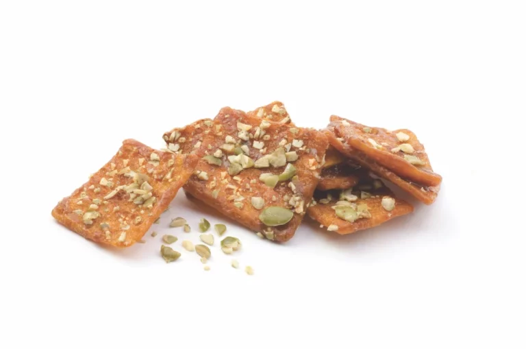 Discover how Regina Ragonese transforms everyday snacks with her patented coated pita chips, blending nutrition, visible superfoods and artisan flavour